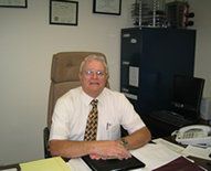 J Mench at desk