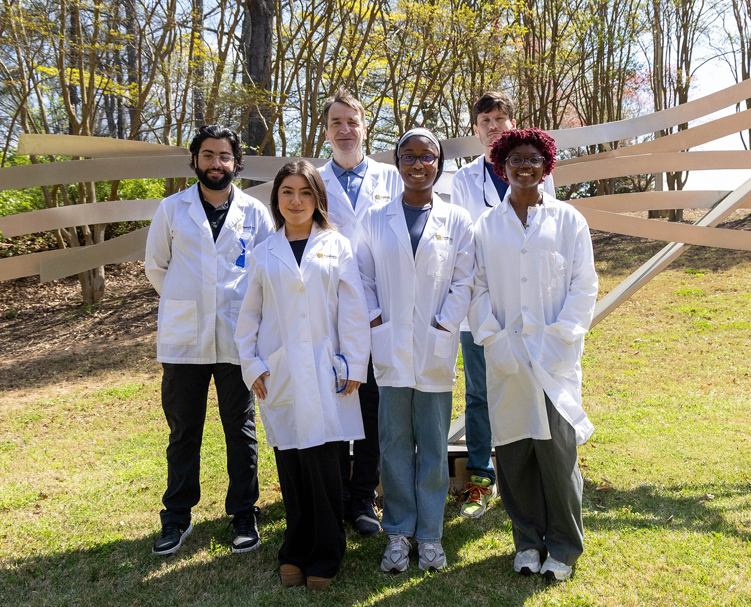 Photograph of the Stollenz Group 2026 (left to right): Austin (Hooman) Salehi, Ximena Arreguin, Sarah Udoudoh, Nylah Carter