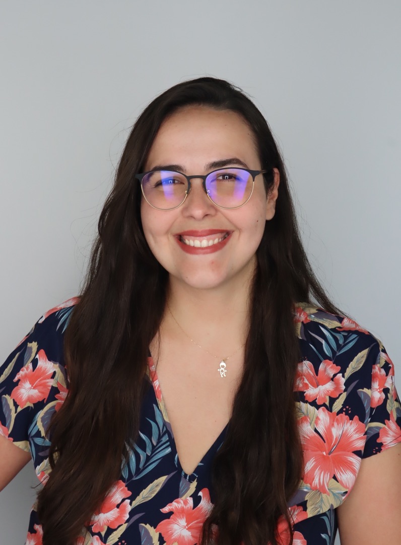 Headshot of Prof. Souza posing with a smile.