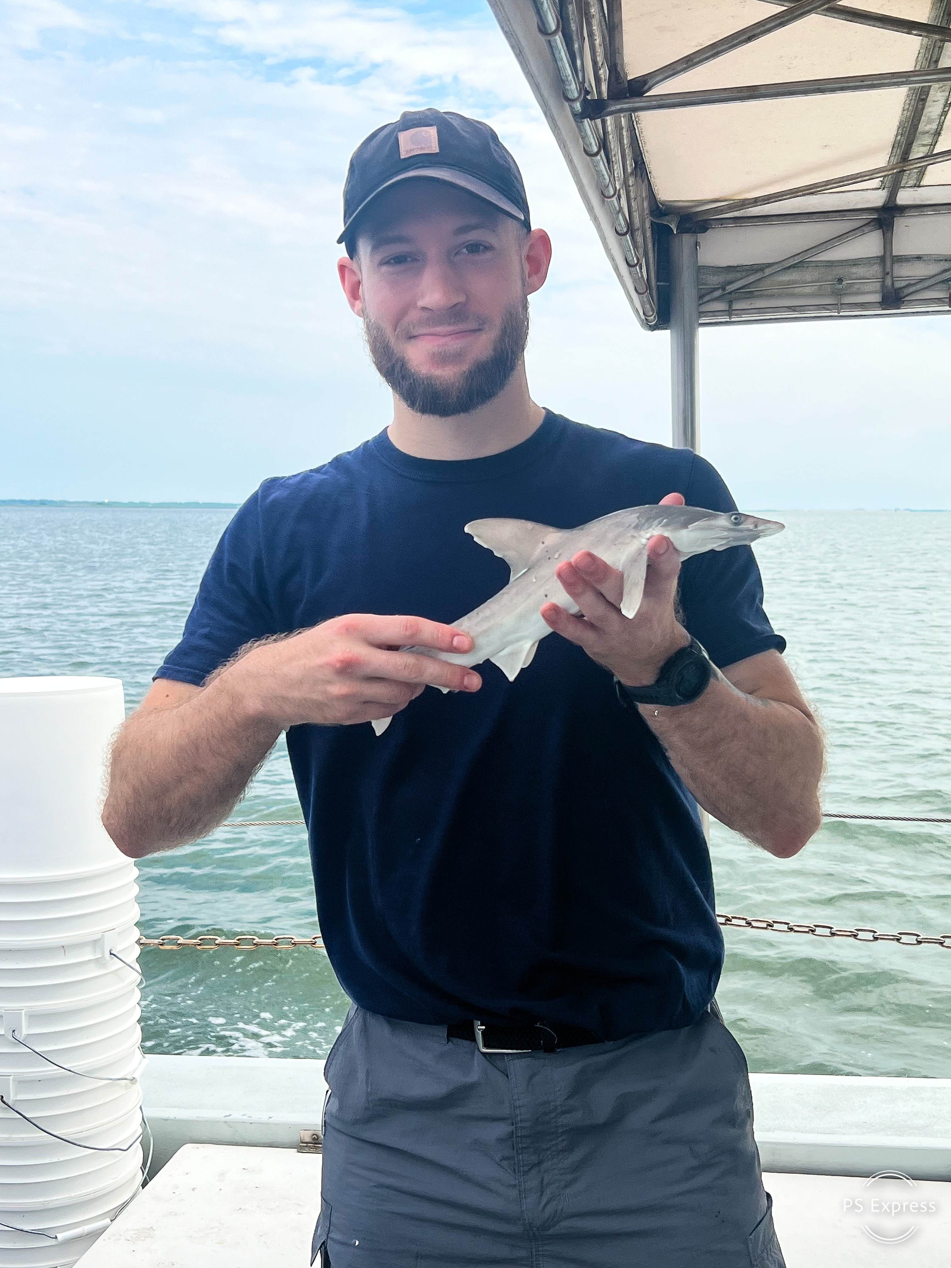 Ben holding a shark