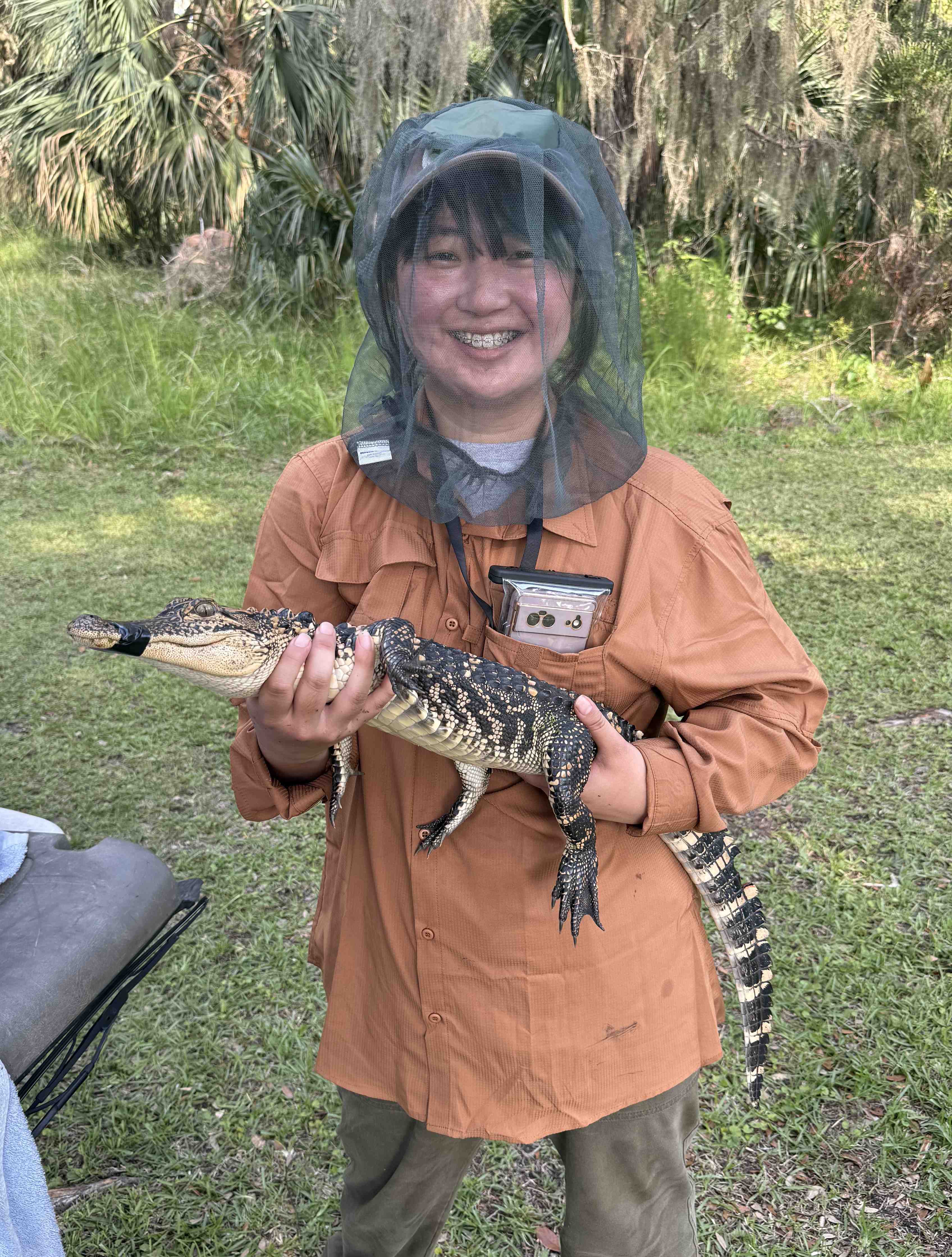 Mayu holding an animal
